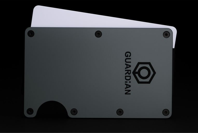 Cartera de aluminio gris oscuro compacta guardiantumbada